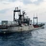 A Sri Lanka Navy vessel approaches an Iranian Navy vessel IRIS Bushehr (422) during a rescue operation, a day after the crew of a distressed Iranian military ship, IRIS Dena, were assisted in waters south of Sri Lanka, off the coast of Colombo, Sri Lanka, March 5, 2026.