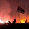Supporters of the electoral list "Student List - Students Win" celebrate after Aleksandar Vucic, Serbian Progressive Party (SNS) prime ministerial candidate, conceded defeat in the parliamentary election in Belgrade, Serbia, October 26, 2026.