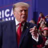 US President Donald Trump arrives on stage to deliver remarks during an election rally at McMorran Place Sports & Entertainment Center in Port Huron, Michigan, Oct. 25, 2026.