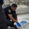 Israel Police collect evidence after finding the body of an east Jerusalem man near the West Bank city of Bethlehem on October 26, 2026.
