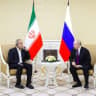 Iranian President Masoud Pezeshkian and Russian President Vladimir Putin attend a meeting in Turkmenbashi, Turkmenistan, October 8, 2026.