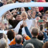Pope Leo greets faithful as he arrives to hold his first weekly general audience in St. Peter's Square since cancer surgery, at the Vatican, October 21, 2026.
