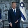 President Isaac Herzog presents the Presidential Award for Civilian Heroism to six passengers who acted heroically aboard a Dubai-Tel Aviv flight on September 30, during a ceremony at the President’s Residence in Jerusalem, October 8, 2026.