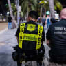Tourist police sit next to each other on Pattaya Beach in Pattaya on September 2, 2026