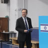 Israeli President Isaac Herzog casts his vote during general elections in Jerusalem on October 27, 2026.