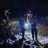Members of the Syrian civil defence group known as the White Helmets take part in rescue operations in the aftermath of airstrikes, at locations given as Daraa Governorate and As-Suwayda Governorate, Syria, in this handout image released October 27, 2026.
