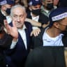 Prime Minister Benjamin Netanyahu, leader of the Likud party, reacts as he tours Mahane Yehuda market, ahead of Israel's national election, in Jerusalem, October 23, 2026