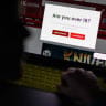  In this photo illustration, a teenage child looks at a screen of age-restricted content on a laptop screen on January 17, 2023 in London, England. (illustrative)