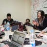Members of Mada Masr work in their office on January 25 2015 in Cairo, Egypt.Mada Masr is a Cairo-based independent news website. 