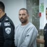 Pinchas Shem Tov Ran, an Israeli civilian security coordinator accused of shooting and seriously wounding a Palestinian woman in the West Bank, arrives at the Jerusalem District Court following his indictment, October 23, 2026. 