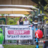 ‘BRINGING BACK the optimism: Women are going out to vote, Oct. 27!’ reads a sign at a Tel Aviv park. 