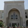 Syrians gather as they celebrate in front of the Palace of Justice after the court proceedings, in Damascus on August 11, 2026