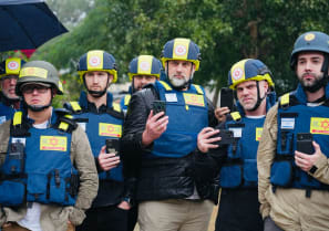   A group of top Anglo pastors tour Kfar Aza on December 13, 2023.