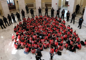 Police officers stand guard during a protest in support of Palestinians inside of the Cannon Office Building one day prior to Israeli Prime Minister Benjamin Netanyahu address to the U.S. Congress in Washington, U.S., July 23, 2024. 