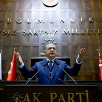 Turkish President Tayyip Erdogan addresses members of parliament from his ruling AK Party (AKP) during a meeting at the Turkish parliament in Ankara, Turkey, June 13, 2017. 