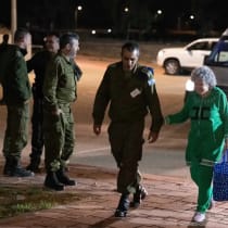  Ruti Munder is escorted by IDF forces on November 24, 2023