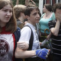 Russia-born U.S. journalist Masha Gessen (front C) takes part in a protest against a proposed new law termed by the State Duma as "against advocating the rejection of traditional family values" in central Moscow June 11, 2013.