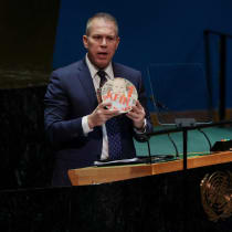  Israeli ambassador to the UN Gilad Erdan holds the picture of a child kidnapped in the October 7 attack by Hamas, on a birthday cake during a plenary meeting on the 'Use of the veto - Item 63: Special report of the Security Council', in the General Assembly Hall at UN headquarter