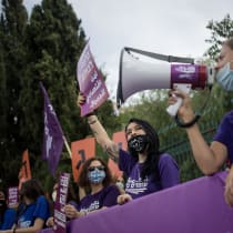 Members of the "Standing Together" movement protest for equal rights of financial support, outside the Israeli parliament on May 14, 2020.