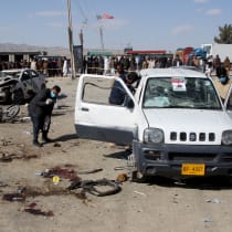  Members of a bomb disposal squad examine the site of a blast in Khanozai, Balochistan, Pakistan, February 7, 2024
