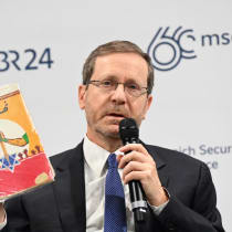  President Isaac Herzog reveals an antisemitic book found in Gaza at the Munich Security Conference, February 17, 2024