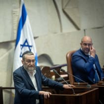  Head of the Finance committee MK Moshe Gafni speaks during a discussion on the state budget at the assembly hall of the Israeli parliament in Jerusalem, March 12, 2024. 