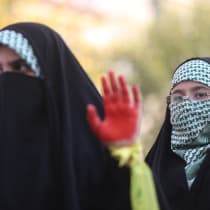  Women members of Basij paramilitary forces attend a rally in support of Palestinians, in Tehran, Iran, November 24, 2023.