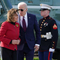  US President Joe Biden speaks to US Representative Nancy Pelosi (D-CA) as he arrives in San Francisco, California, US February 21, 2024.