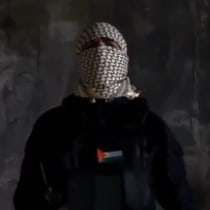  A masked individual threatens the 2024 Paris Olympics with "rivers of blood." July 23, 2024.