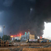  FLAMES AND smoke rise from the site of Israeli air strikes at the port of Hodeidah, Yemen, last week. 