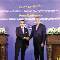  IRANIAN ATOMIC Energy Organization chief Mohammad Eslami (right) and IAEA head Rafael Grossi shake hands after a joint news conference in Isfahan, Iran, in May. 