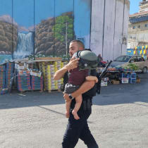  Police rescue toddlers from the Shuafat camp in east Jerusalem, August 7, 2024.
