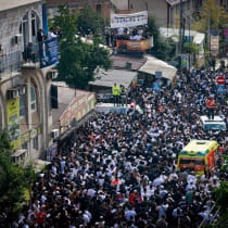  Jewish men in the street during Tikkun HaKlali near the tomb of Rabbi Nachman of Breslov in Uman, on eve of the Jewish holiday of Rosh Hashanah, September 15, 2023. 