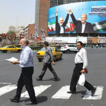  A BILLBOARD overlooking a main street in Tehran shows assassinated Hamas chief Ismail Haniyeh (left) and Iran’s President Masoud Pezeshkian.