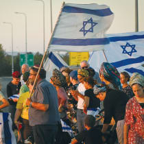  AIMING FOR the strengthening of Israeli unity, people gather with Israeli flags at one of some 100 locations around the country, in Hispin, Golan Heights, in August.