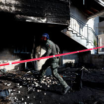 Israeli security personnel works on site of a house damaged after a barrage of rockets was fired from Lebanon into Israel, in Tamra, northern Israel October 27, 2024