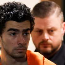  Luigi Mangione, 26, a suspect in the New York City killing of UnitedHealth executive Brian Thompson, is escorted after an extradition hearing at Blair County Court House in Hollidaysburg, Pennsylvania, U.S. December 10, 2024.