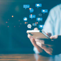  Hand using mobile smartphone with icon social media and social network.