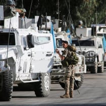  A Lebanese army soldier stands near UN peacekeepers (UNIFIL) vehicles in Marjayoun, near the border with Israel, amid ongoing hostilities between Hezbollah and Israeli forces, southern Lebanon October 29, 2024.