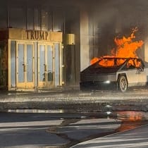  Flames rise from a Tesla Cybertruck after it exploded outside the Trump International Hotel Las Vegas, in Las Vegas, Nevada, US, January 1, 2025.