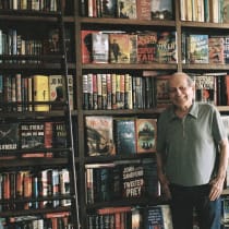    An official photo, pictures from Amnon's home with the unique library containing tens of thousands of books