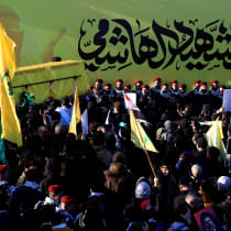  The coffin of late Hezbollah leader Hashem Safieddine, who was killed during Israeli airstrikes last year, is carried during his burial, in Deir Qanoun al-Nahr, southern Lebanon February 24, 2025. 