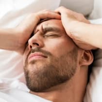  A man suffering from a headache 