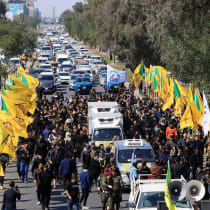 Mourners march in the funeral of a Kataib Hezbollah terrorist after a US airstrike on a Popular Mobilization Forces headquarters near the Iraq-Syria border, pictured in Baghdad, March 2, 2026.