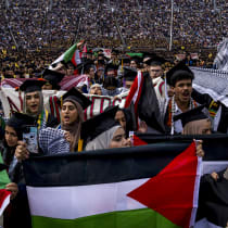 Students demonstrate during a pro-Palestinian protest during the University of Michigan’s spring commencement ceremony on May 4, 2024 at Michigan Stadium.