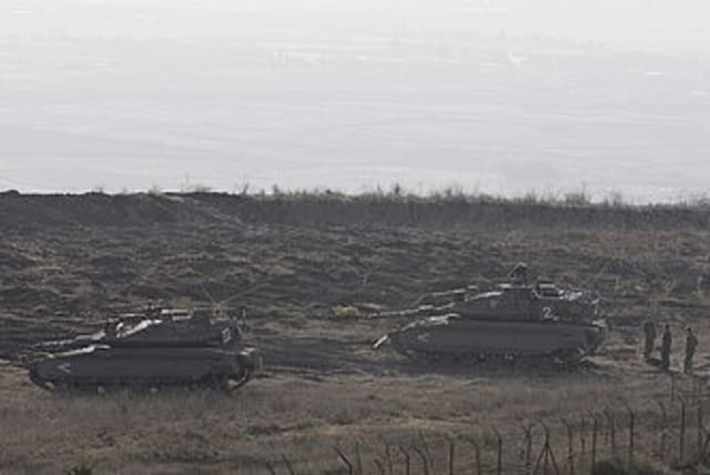 IDF tanks along the Syrian border on Golan Heights 370 (R) (photo credit: Baz Ratner / Reuters)