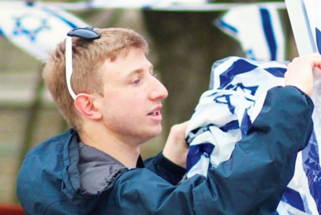 Boy with Israeli flag  (photo credit: Courtesy)