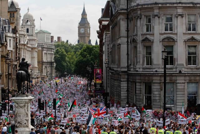 Demonstrators march in central London July 19 (photo credit: REUTERS)