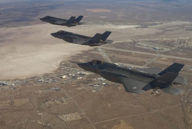 Three F-35 Joint Strike Fighters can be seen flying over Edwards Air Force Base (photo credit: REUTERS)