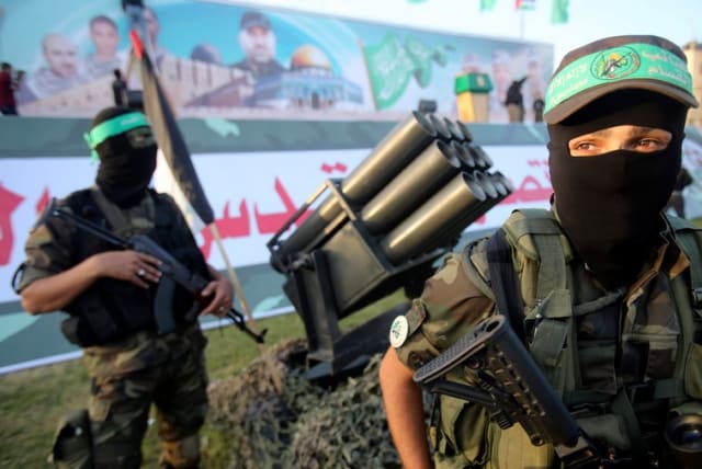 Hamas members at an anti-Israel rally in Rafah in southern Gaza, November 13, 2014.  (photo credit: REUTERS)